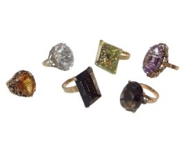 Six 1970s gold and gem-set cocktail rings, each set with a large gem stone in gold setting (6)