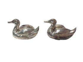 Pair of silver duck shaped menu holders