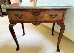 Early 18th century walnut and feather banded lowboy