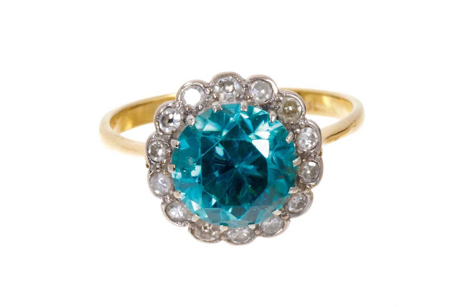 Blue zircon and diamond ring