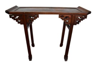 Antique Chinese hardwood altar table, the dished top with scrolled ends, raised on angular pierced b