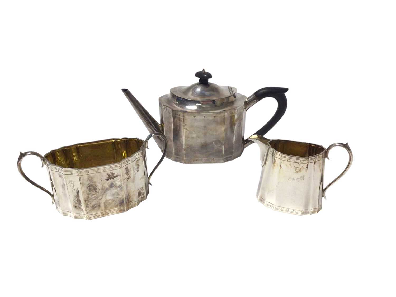 Composite three piece silver teaset in the Georgian style,