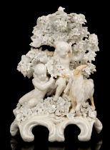 Large Plymouth white glazed bocage figure group with putti and goat