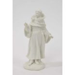 18th century white glazed standing figure of a monk, probably Bow, losses