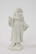 18th century white glazed standing figure of a monk, probably Bow, losses
