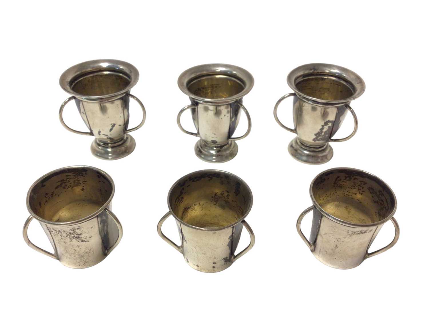 Group of six Edwardian miniature silver cups