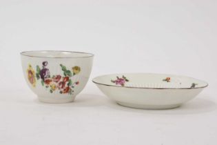 Derby ribbed tea bowl and saucer, painted with flowers, circa 1758