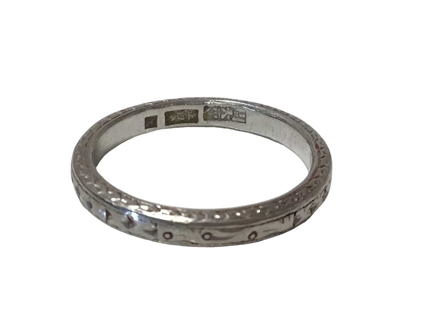 Chinese platinum wedding ring with engraved decoration, Chinese hallmarks, ring size L½. - Image 2 of 2