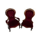 Pair of mid Victorian his and hers upholstered easy chairs