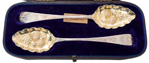 Pair George III silver table spoons, later converted to berry spoons, with ornate fruit bowls