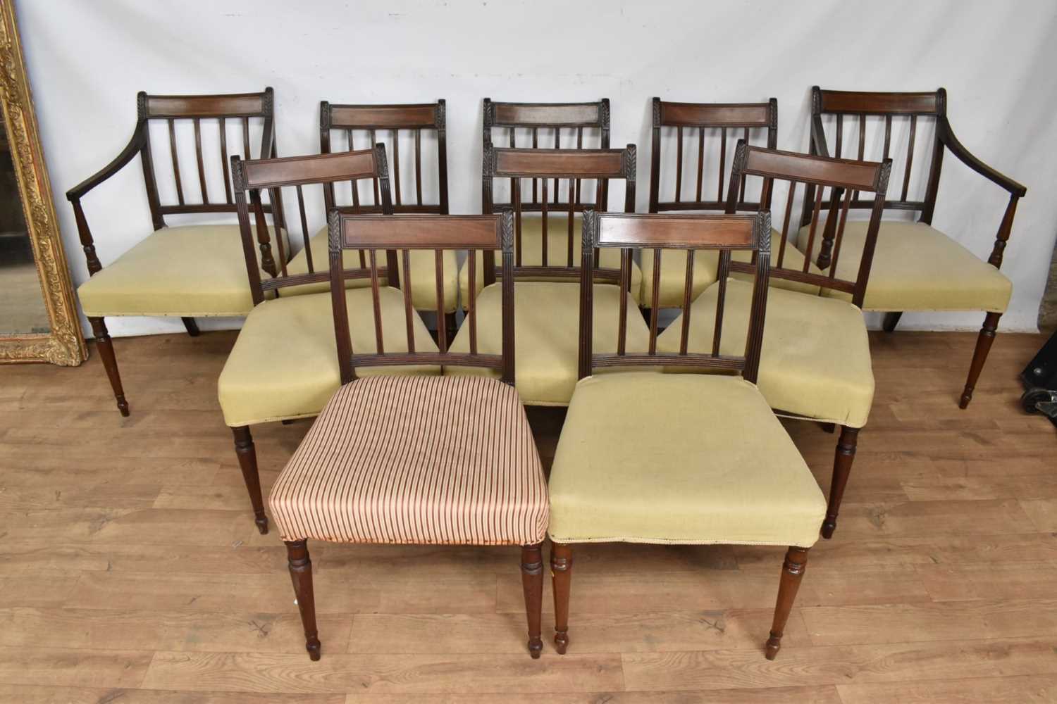 Set of ten dining chairs comprising eight George III mahogany dining chairs