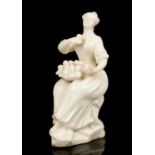 18th century white glazed porcelain figure of a woman