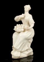 18th century white glazed porcelain figure of a woman