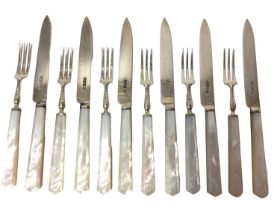 Set of six pairs silver and mother of pearl fruit knives and forks