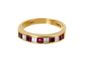 Ruby and diamond eternity ring in 18ct gold setting