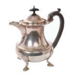 Silver teapot with ebony handle