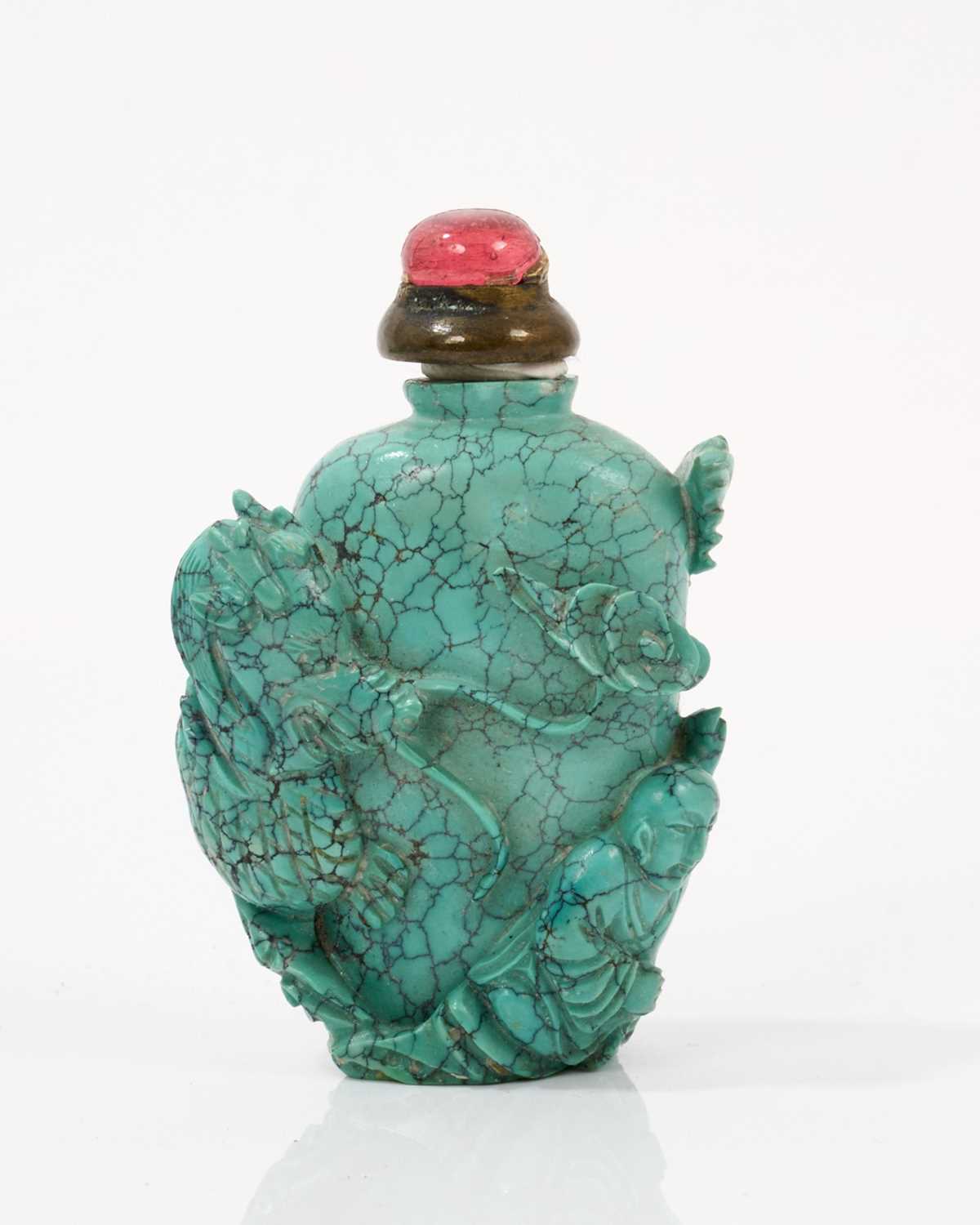 Carved lapis snuff bottle