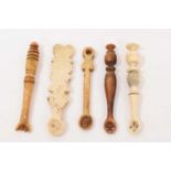 Group of five rare turned bone and horn snuff spoons