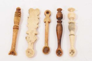 Group of five rare turned bone and horn snuff spoons