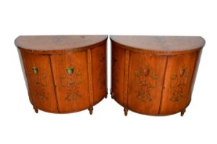 Pair of George III style satinwood and polychrome painted bowfront commodes
