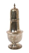 1930s silver caster of baluster form with a pierced and engraved slip in cover