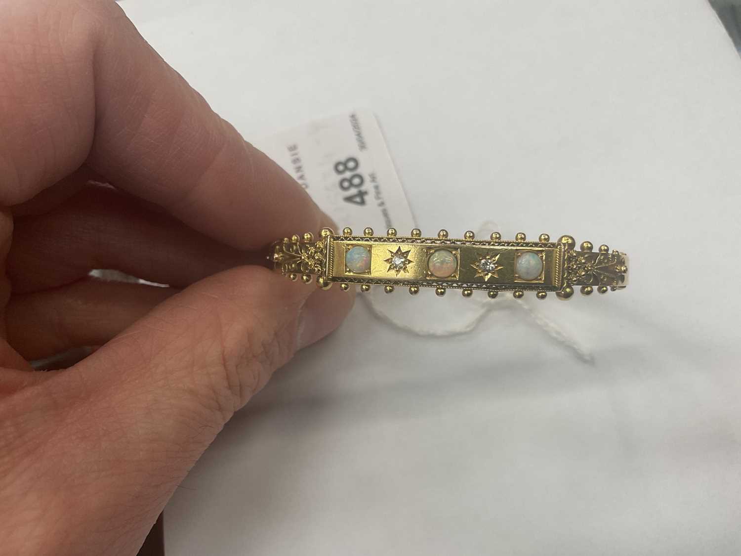 Late Victorian 15ct gold opal and diamond hinged bangle - Image 4 of 5
