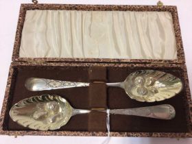 Pair George III silver table spoons, later converted to berry spoons