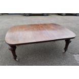 Victorian Irish mahogany extending dining table with one additional leaf by Strahan & Co