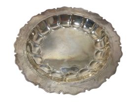 1920s Scottish silver dish of circular form with scalloped decoration and decorative border