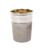 Silver thimble shaped tot cup