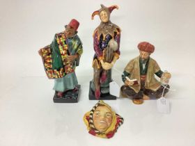 Three Royal Doulton figures - The Jester, Carpet Seller and Omar Khayyam