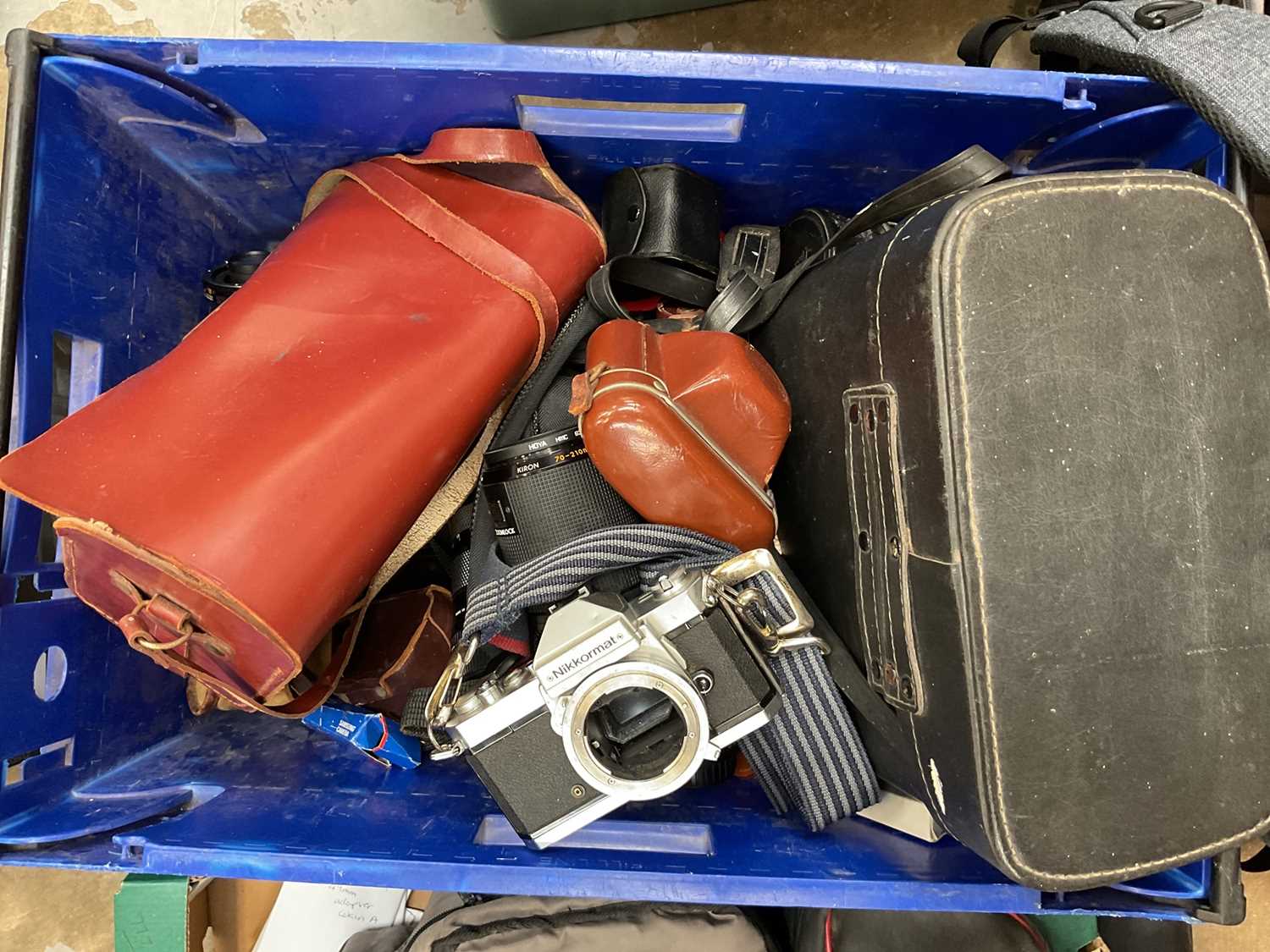 Three boxes of cameras