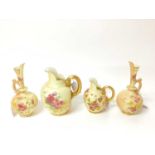 Group of Royal Worcester bush ivory porcelain with gilded and floral decoration to include two jugs,