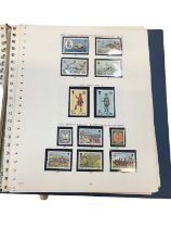 Stamps and postcards selection in box including GB mint stamps, IOM collection covers etc