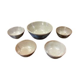 Suite of Leach St Ives pottery bowls, including larger bowl, 22cm diameter and set of four, all abst