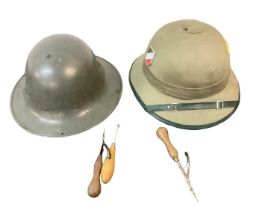 Two Second World War British Zuckerman Civil Defence helmets, together with other military helmets (