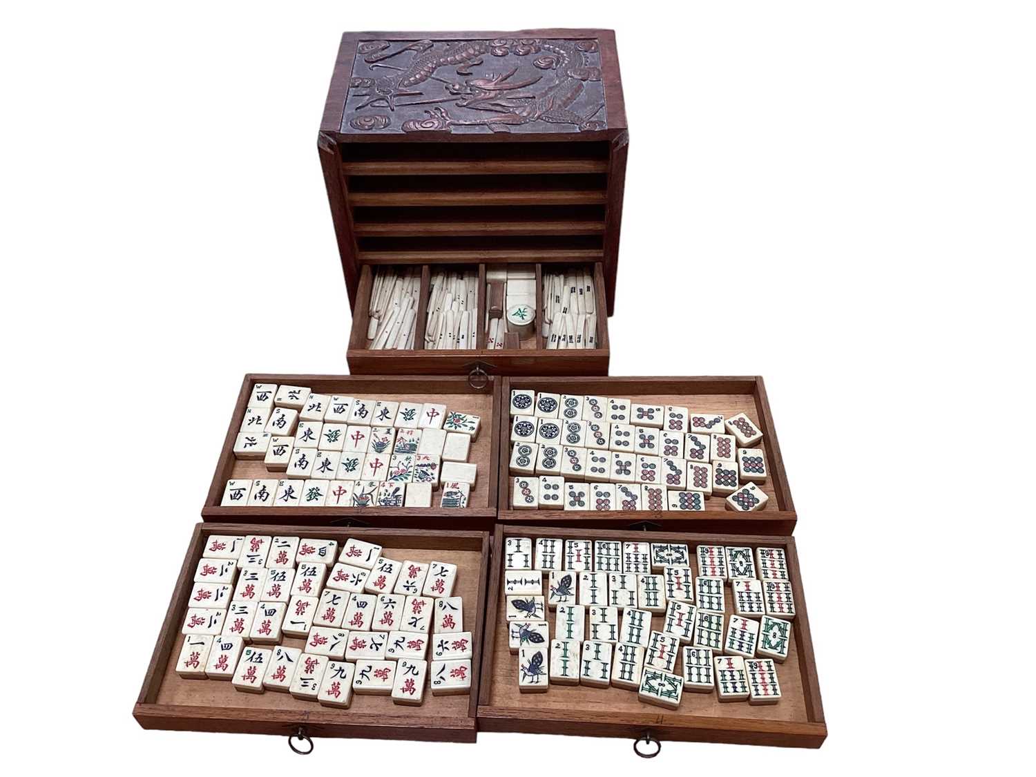 Chinese bone and bamboo Mahjong set in a carved wooden case