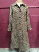 Aquascutum women's wool tweed overcoat with attached scarf.