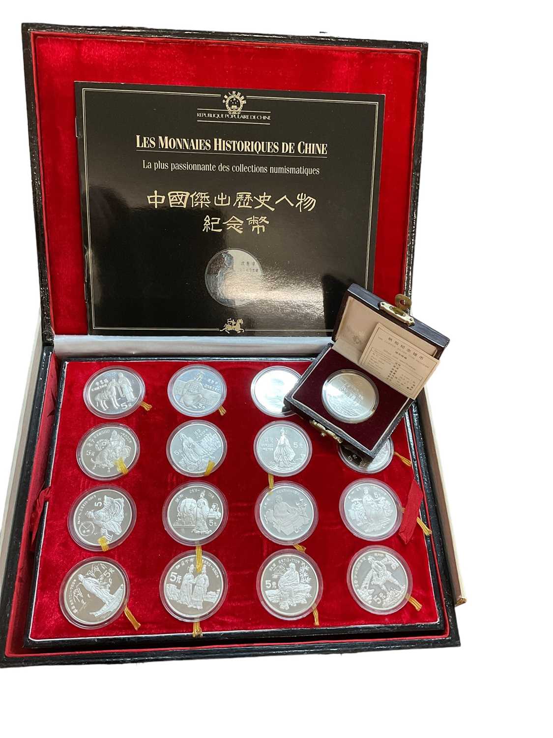 China - A cased numismatic collection of thirty two silver proof 5 Yuan coins 1987