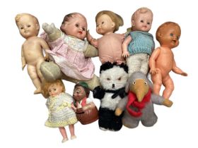 Small toys 1950s and later. including newborn doll, soft rubber dolls, Palitoy doll, mohair panda be