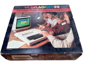 1970s Dragon 32 Family computer in original box together with a suitcase of accessories to include S