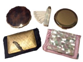 Four vintage powder compacts including two Stratton, one mother of pearl and one Italian gilt metal,