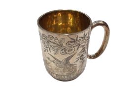 Victorian silver christening mug with engraved decoration of birds, (London 1885)