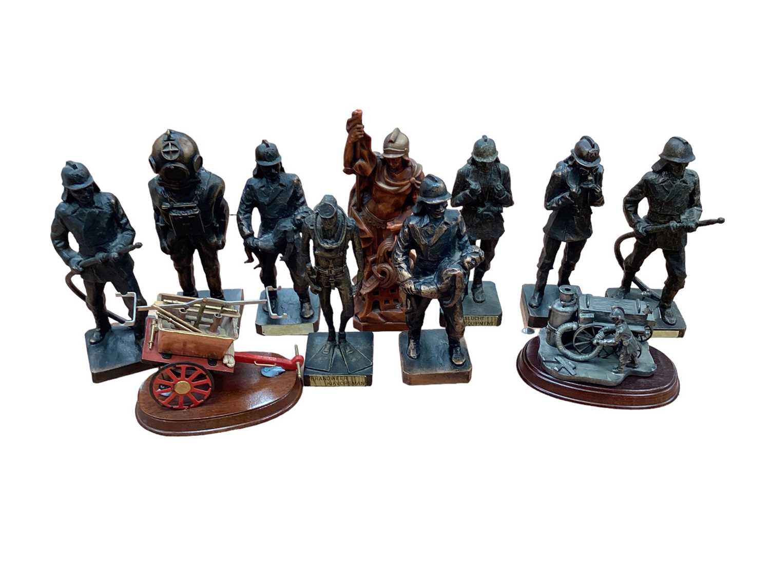 Collection of Fire Brigade related collectables, shields, figures and others.