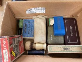 Box of vintage shaving equipment including razors, shaving brush, etc, mostly boxed