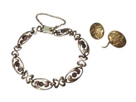 Edwardian 9ct gold open work gem set bracelet and one 15ct gold cufflink