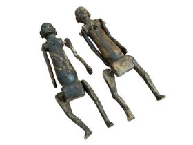 Pair of African tribal jointed dolls