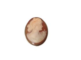 Carved shell cameo brooch with gold mount, marked 14k. 38mm