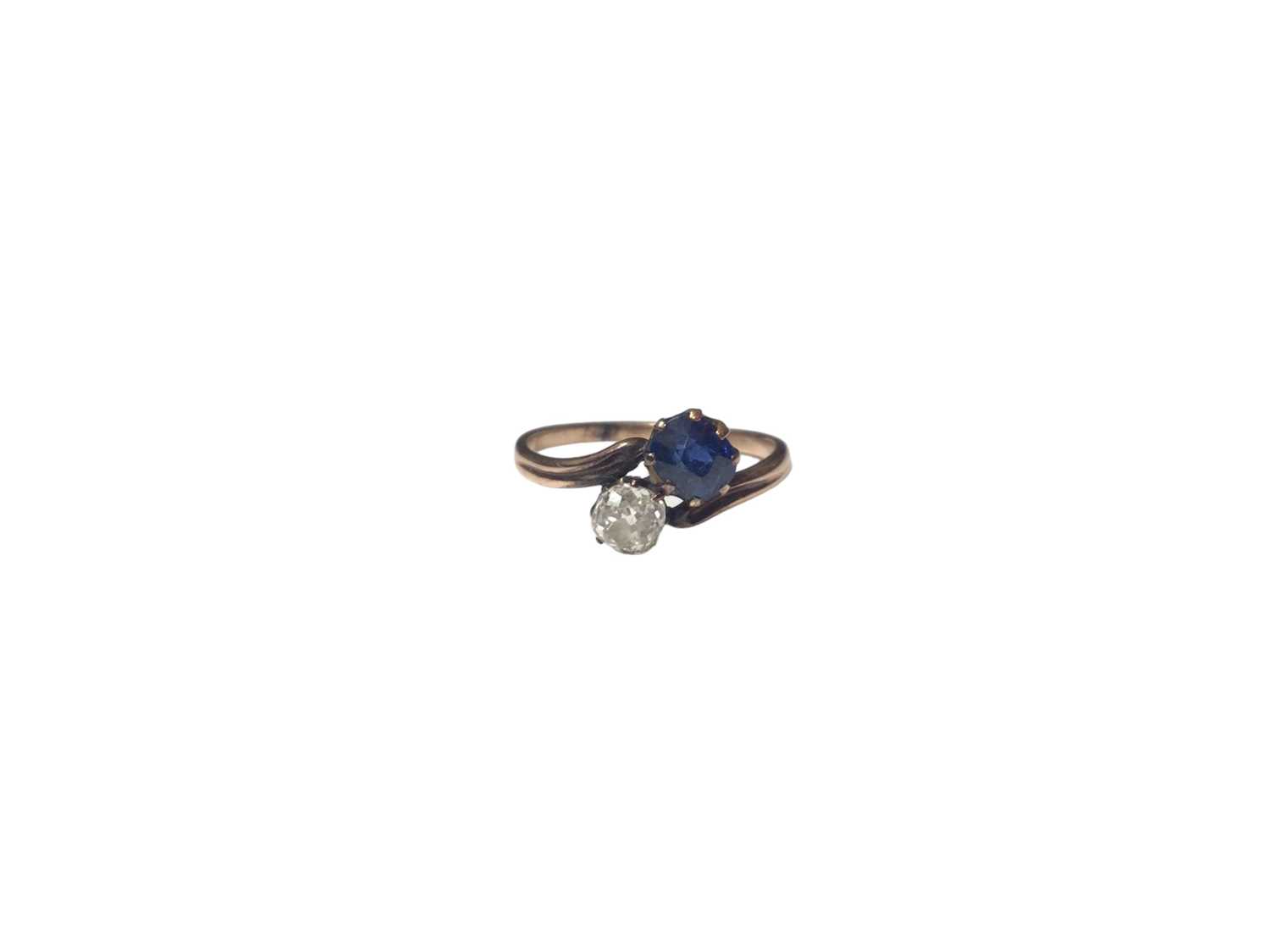 Victorian sapphire and diamond two stone cross over ring