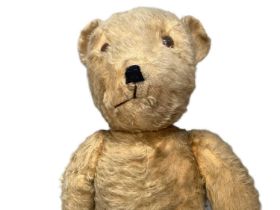 1950s Golden Mohair teddy bear, velvet paws, disc jointed, 70cms approximately.